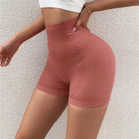 Shorts Fitness sem costura com forte modelagem