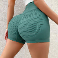 Shorts Fitness sem costura com forte modelagem