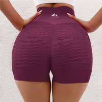 Shorts Fitness sem costura com forte modelagem